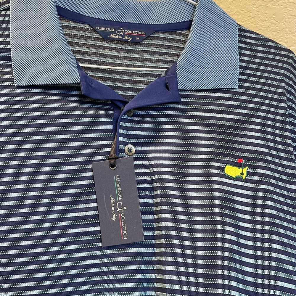 NWT masters polo. Navy Blue. With tags. Pristine condition.